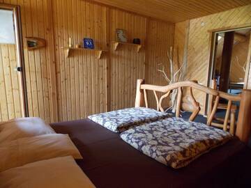 Фото номера Дом с 3 спальнями Дома для отпуска Guest House Kalniņi г. Карли 7